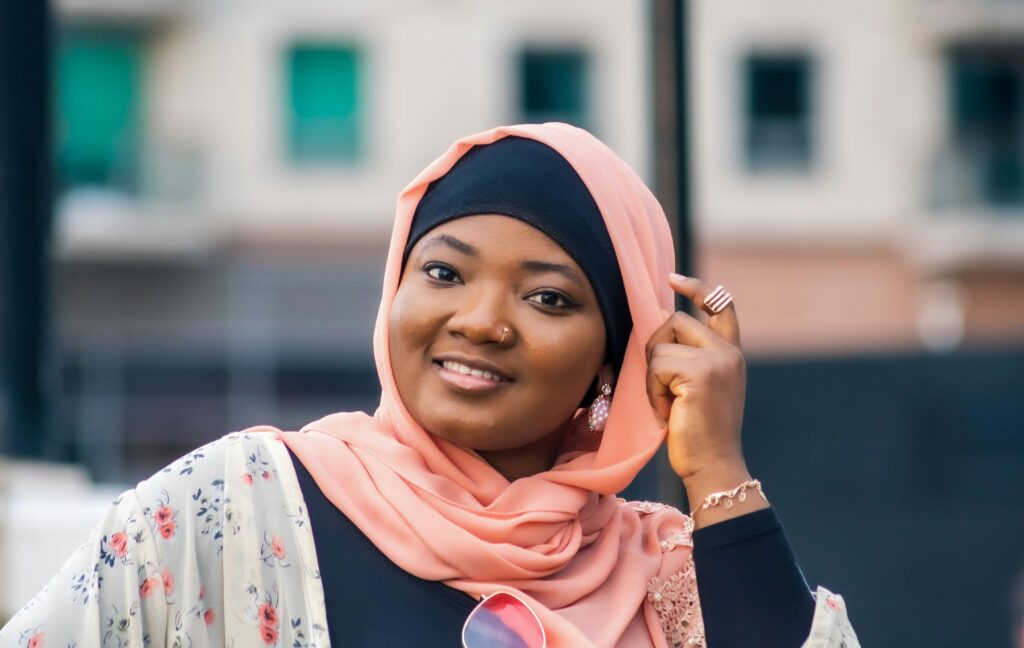 A lady smiling after using FroggyTalk International calling app